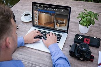 Person at computer with PhotoModeler screen